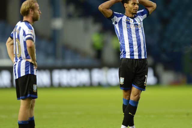 A disappointing night for the Owls Barry Bannan and Jacob Murphy. Pic Steve Ellis