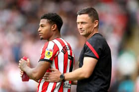 Paul Heckingbottom, the manager of Sheffield United, embraces Rhian Brewster: Cameron Smith/Getty Images