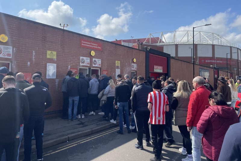 Sheffield United fans queue outside Bramall Lane ahead of their match against Cardiff City