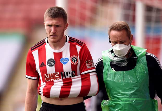 Sheffield United's John Lundstram goes off injured during the FA Cup quarter final match at Bramall LaneOli Scarff/NMC Pool/PA Wire.