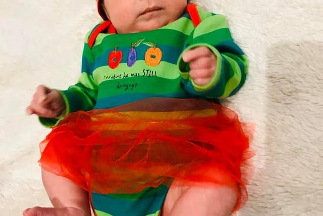 Clemence, who is six weeks old, is the picture of cuteness as the Hungry Caterpillar.