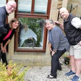 Previously all visitors had to remain outside when they wanted to see family members in care homes. Here, at Beechy Knoll Care Home, family members celebrate resident Kitty's 104th birthday last year. Family members l-r: Dave Little, Helen Cox, Jackie and Richard Little.