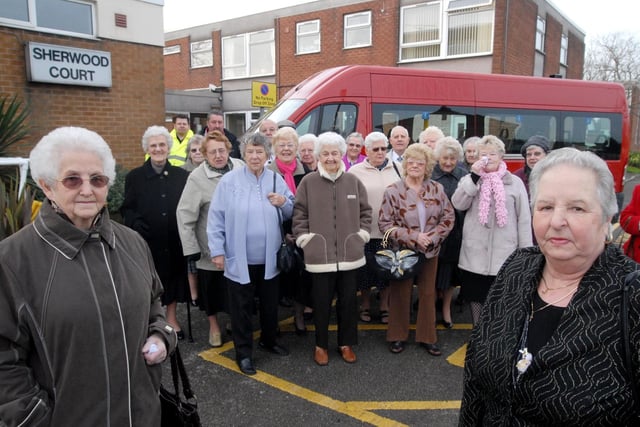 Residents at Sherwood Court  Kirkby were angry that their bus service may get stopped pic shows Jean Connah and Peggy Giles  front along with other residents in 2009