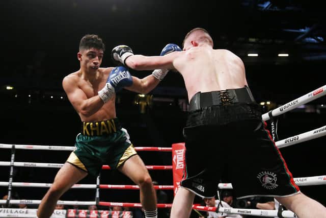 Abdul Khan (left) and Ricky Starkey during their Featherweight contest at AO Arena on February 19, 2022 in Manchester, England. (Photo by Nigel Roddis/Getty Images)