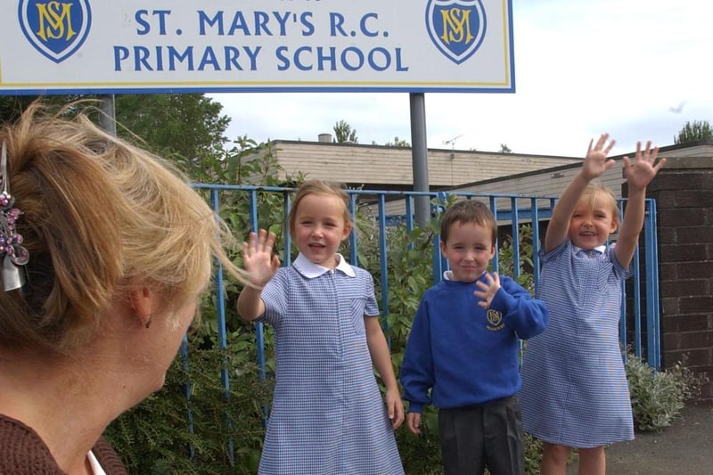 First day at school in triplicate for Gabriella, Nicky and Francesca Richardson as they arrive at St Mary's RC Primary in Sunderland in 2006.