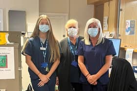 Thail (centre) with care navigator colleagues at Chapelgreen Practice