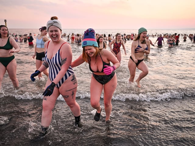 Portobello Beach has long been enjoyed by wild swimmers. There's something invigorating about plunging into the cold waters that leads to people flocking to the beach even on Christmas day. Swimmers tend to paddle parallel to the shore, taking in the beautiful stretch of sandy beach and promenade. (Photo by Jeff J Mitchell/Getty Images).
