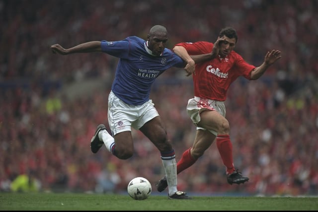 Andy Morris holds off Gianluca Festa during the FA Cup Semi-Final at Old Trafford.