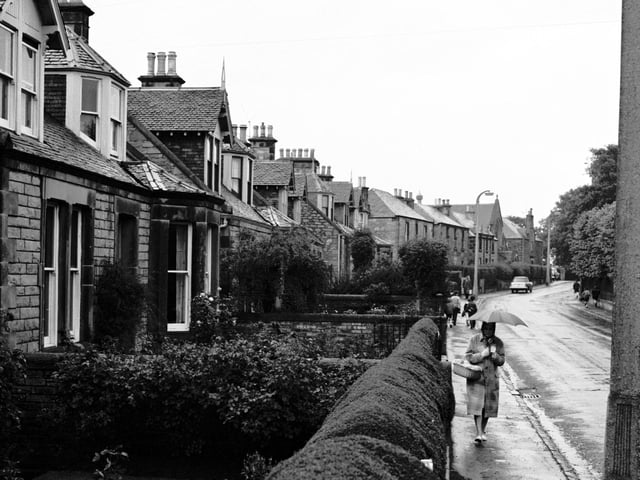 View of Kirkgate, Liberton, in 1965, showing  front gardens with neatly trimmed hedges.