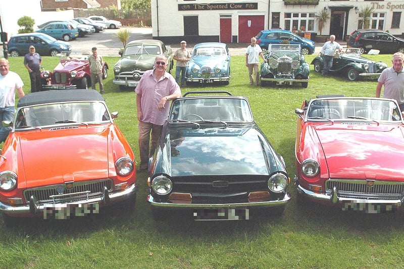 A display of classic cars on the village green. Are you pictured in this 2007 photo?