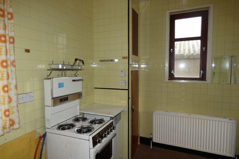 This three bedroom detached bungalow is on sale in Thurso, Caithness for offers in the region of £70,000. It has lots of original features and extremely high ceilings which will make for an excellent renovation project.