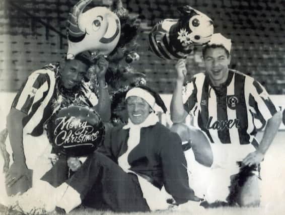 United's Christmas party in 1992 took place in the summer in a bid by manager Dave Bassett, pictured with Brian Deane and Brian Gayle, to inspire his side to replicate their post-Christmas form of the previous two seasons.
