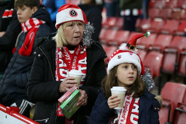 United supporters get into the festive spirit for the Boxing Day clash with Watford.