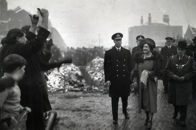 The Queen Mother got the thumbs up when she visited Coleford Road January 6, 1941