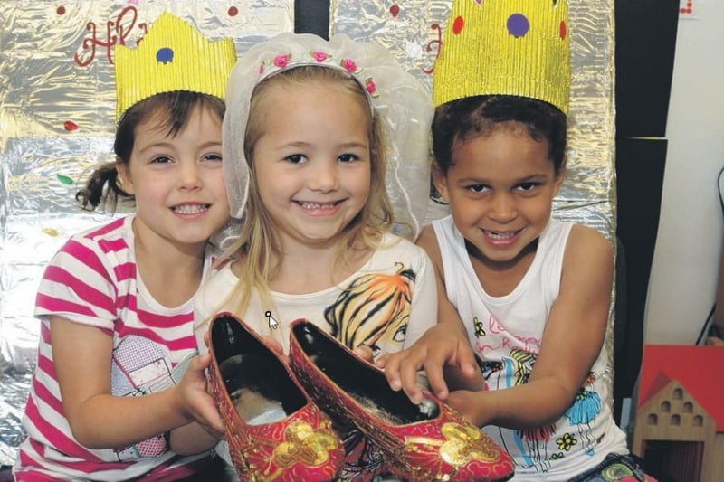 These three young princesses decided these were the best shoes for the bride at the party at Butlers Hill Children's Centre in Hucknall