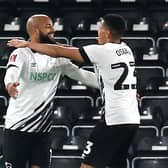 Derby County's William Osula (right) celebrates scoring his side's second goal of the game with team-mate David McGoldrick, formerly of Sheffield United: Nigel French/PA Wire.