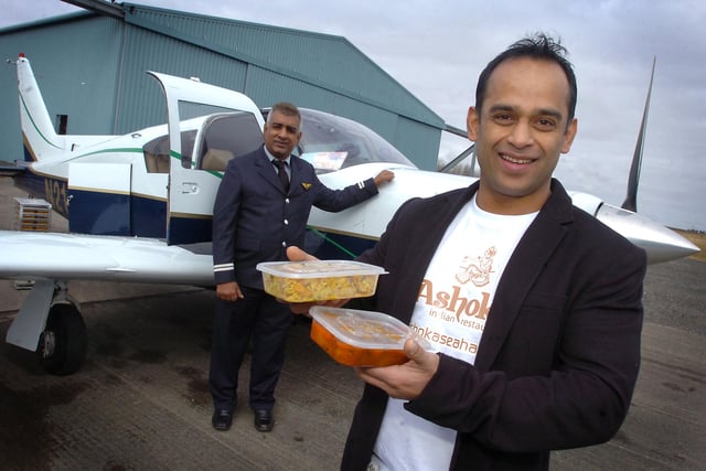 Akki Ahmed from Ashoka indian restaurant in Seaham with pilot, Mustafa Azim who was about to set off on their journey to the Congo in Africa to deliver 100 curries in 2013.