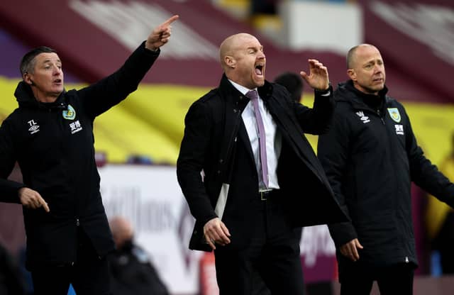 Sean Dyche, manager of Burnley gives his team instructions during the Premier League match between Burnley and West Bromwich Albion at Turf Moor on February 20, 2021.