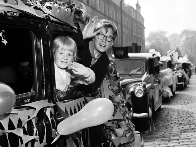 Youngsters show their excitement as they set off on the Edinburgh taxi drivers' annual outing for disabled and under-privileged children in June 1967