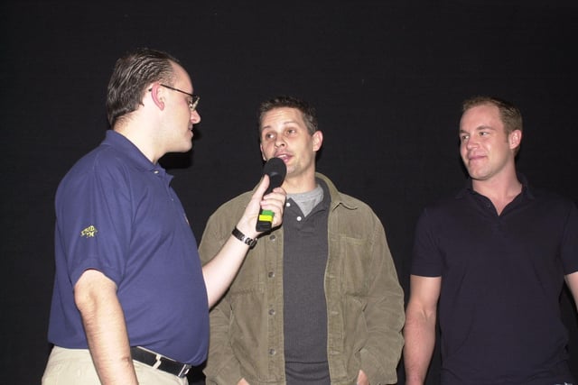 Kingdom FM's Ali McLaren interviews Fife Flyers stars Mark Morrison (centre) and Karry Biette at the 2002 Glenrothes Christmas lights switch on at the Kingdom Centre, Glenrothes (Pic: Fife Free Press)