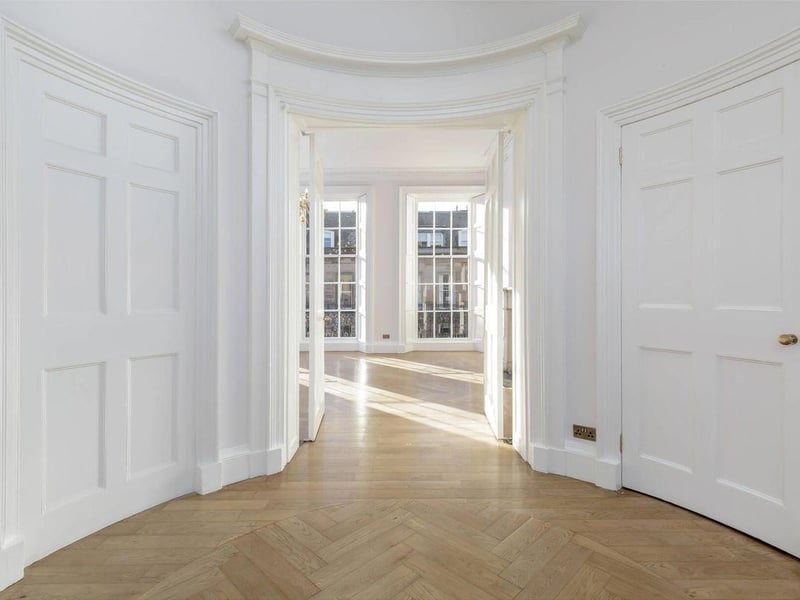 Master bedroom looking through to drawing room.