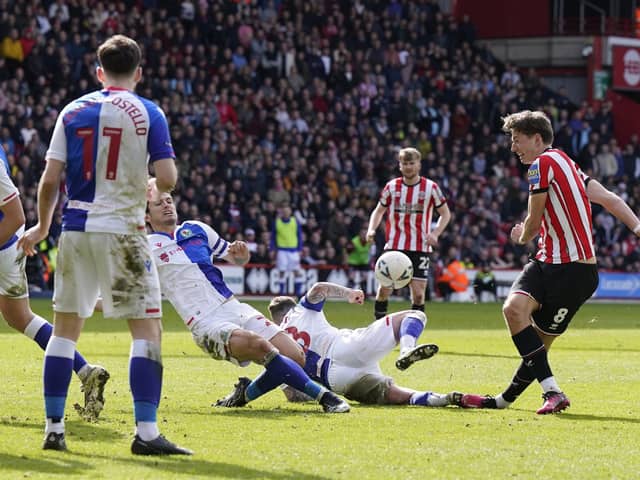 Sander Berge of Sheffield United has a shot on goal blocked : Andrew Yates / Sportimage