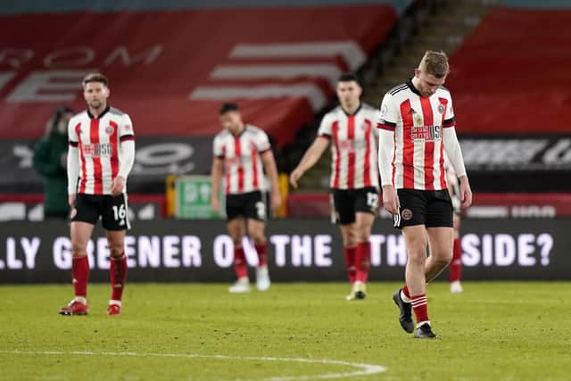 Oli McBurnie (R) hopes to return to action for Sheffield United: Andrew Yates/Sportimage