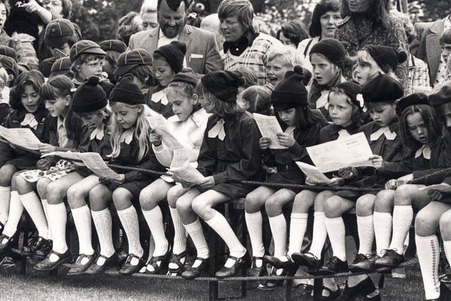Brownies enjoying the Weston Park Whit Sing....  May 26, 1975