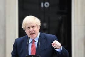 Prime Minister Boris Johnson makes a statement outside 10 Downing Street, London, as he resumes working after spending two weeks recovering from Covid-19. PA Photo: Stefan Rousseau/PA Wire