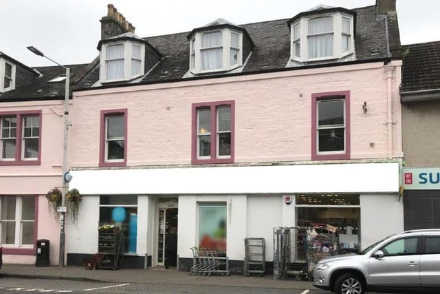 A ground floor retail unit, formerly a supermarket, contained within a traditional tenement building in the heart of the village - £110,000.