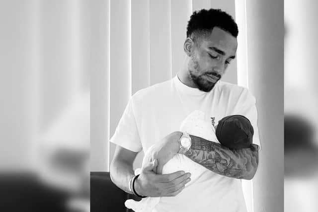 Kean Bryan with baby Monroe, his second child with Brooke Vincent