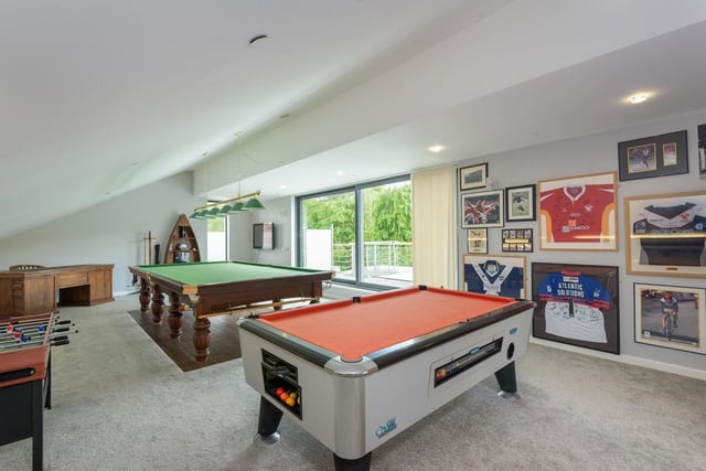 The games room is located in the largest room on the second floor. It has tremendous views across the large garden and shares the second floor with a bedroom and the cinema room.