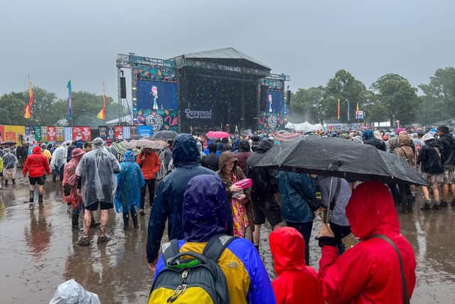 Tramlines festival goers caught in the torrential rain that hit Hillsborough Park. Residents have said where they think the major Sheffield festival should take place after weekend mud bath. PIcture: Dean Atkins