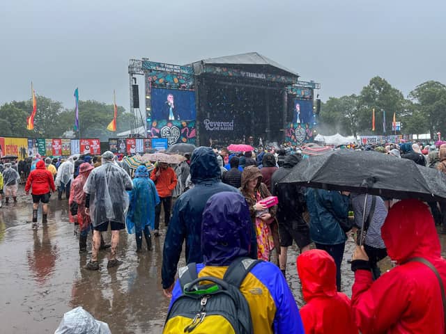 Tramlines festival goers caught in the torrential rain that hit Hillsborough Park. Residents have said where they think the major Sheffield festival should take place after weekend mud bath. PIcture: Dean Atkins
