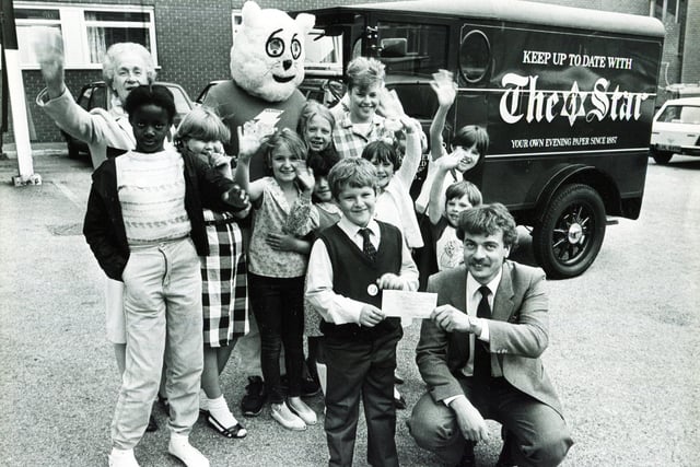 Gloops pictured at a cheque presentation at the Children's Hospital in May 1984