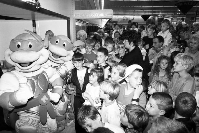 The Teenage Mutant Ninja Turtles entertain the crowd at Meadowhall Savacentre, September 8, 1990
