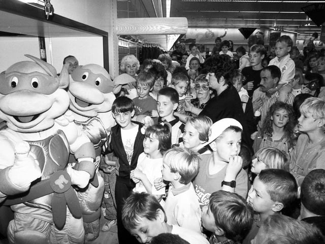 The Teenage Mutant Ninja Turtles entertain the crowd at Meadowhall Savacentre, September 8, 1990