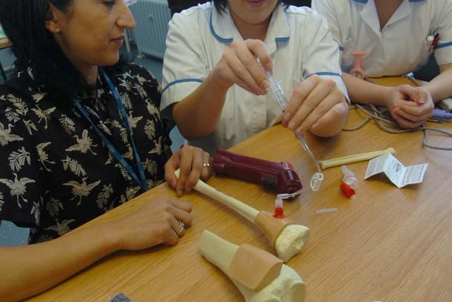 Dr Dita Aswani, left, with student nurses Rebecca Forbes and Alison Turner doing an intraosseous needle demonstration at a new Sheffield Children's Hospital Clinical Skills Centre in December 2010