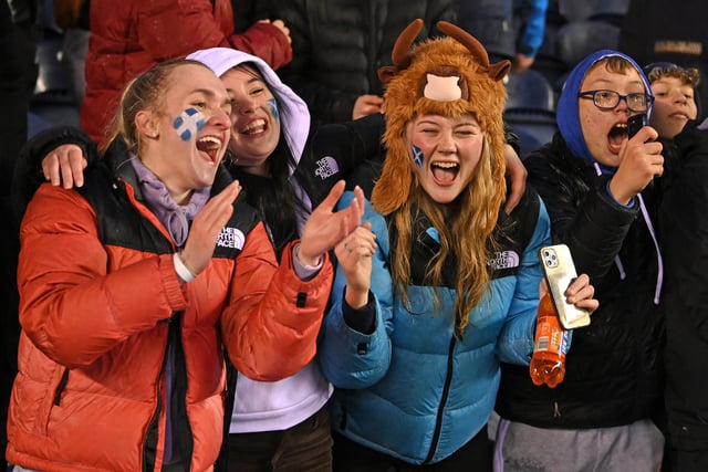 Scotland fans celebrate victory after the Guinness 6 Nations win over England at BT Murrayfield.