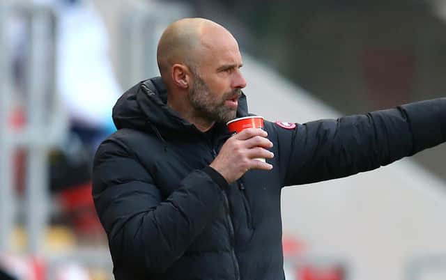 ROTHERHAM, ENGLAND - APRIL 13: Rotherham manager Paul Warne gives out instructions from the sidelines whilst enjoying a brew during the Sky Bet Championship match between Rotherham United and Queens Park Rangers at AESSEAL New York Stadium on April 13, 2021 in Rotherham, England. (Photo by Alex Livesey/Getty Images)