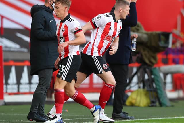 John Lundstram (R) could play for Sheffield United against West Ham despite being linked with the Londoners: Simon Bellis/Sportimage