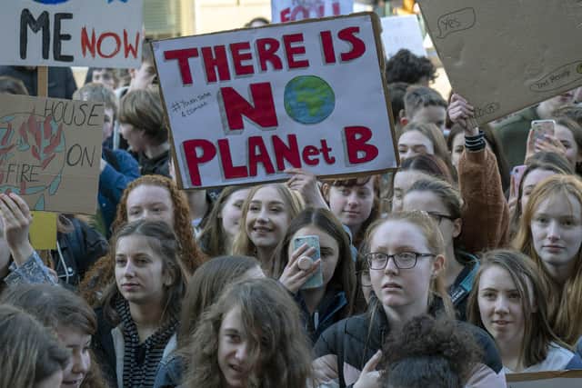 School students getting their message across at the Youth Climate Strike outside Sheffield Town Hall in February 2019