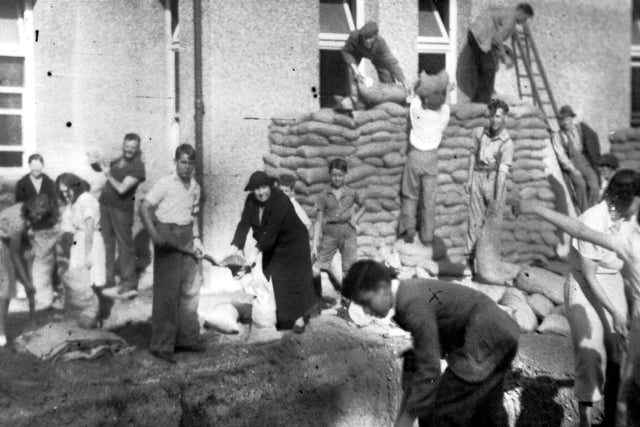 John Blackman (15) (at front right) filling sandbags at Gosport War Memorial Hospital in 1939.
Historic wartime documents donated to Gosport Museum by Jean Hanson-Vaux