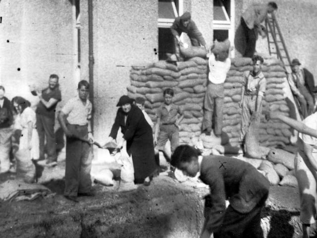John Blackman (15) (at front right) filling sandbags at Gosport War Memorial Hospital in 1939.
Historic wartime documents donated to Gosport Museum by Jean Hanson-Vaux