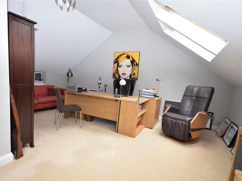 Another view of the spacious bedroom suite, which could be used as an annexe. It has a vaulted ceiling, giving a luxurious feel.