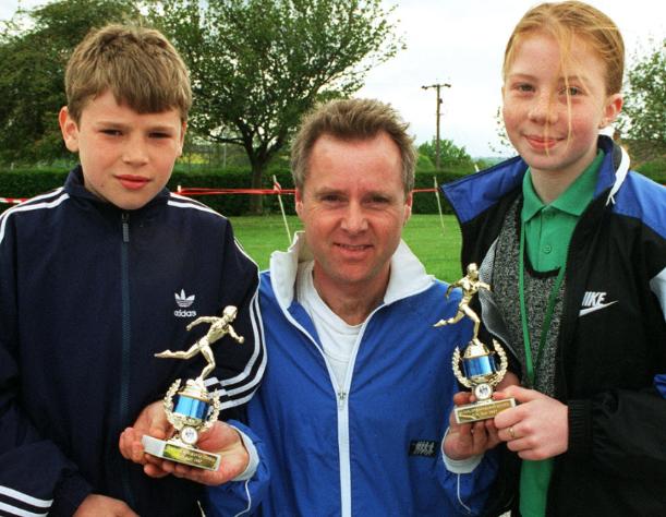 On Sunday, May 12, 1997 there was a fun run at Barnburgh Primary. Photographed are the two winners Richard Lindsay and Miriam Evans with marathon runner Tony-Barron Amith.