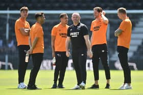 Wayne Rooney manager of Derby County and players look on before the pre-season friendly match between Derby County and Manchester United at Pride Park. (Photo by Nathan Stirk/Getty Images)