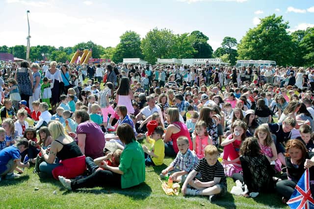 Crowds gather in Zetland Park