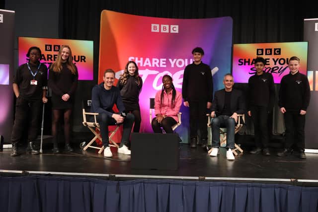 Dan Walker, Tim Davie and Shanequa Paris with students at Meadowhead School in Sheffield, which they visited as part of the BBC 100 Share Your Story project