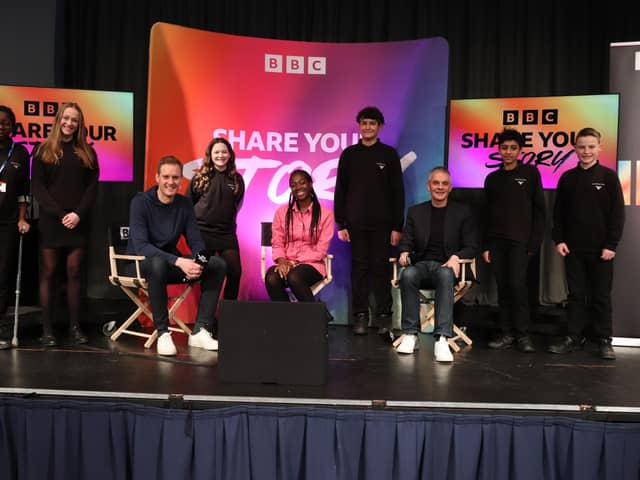 Dan Walker, Tim Davie and Shanequa Paris with students at Meadowhead School in Sheffield, which they visited as part of the BBC 100 Share Your Story project